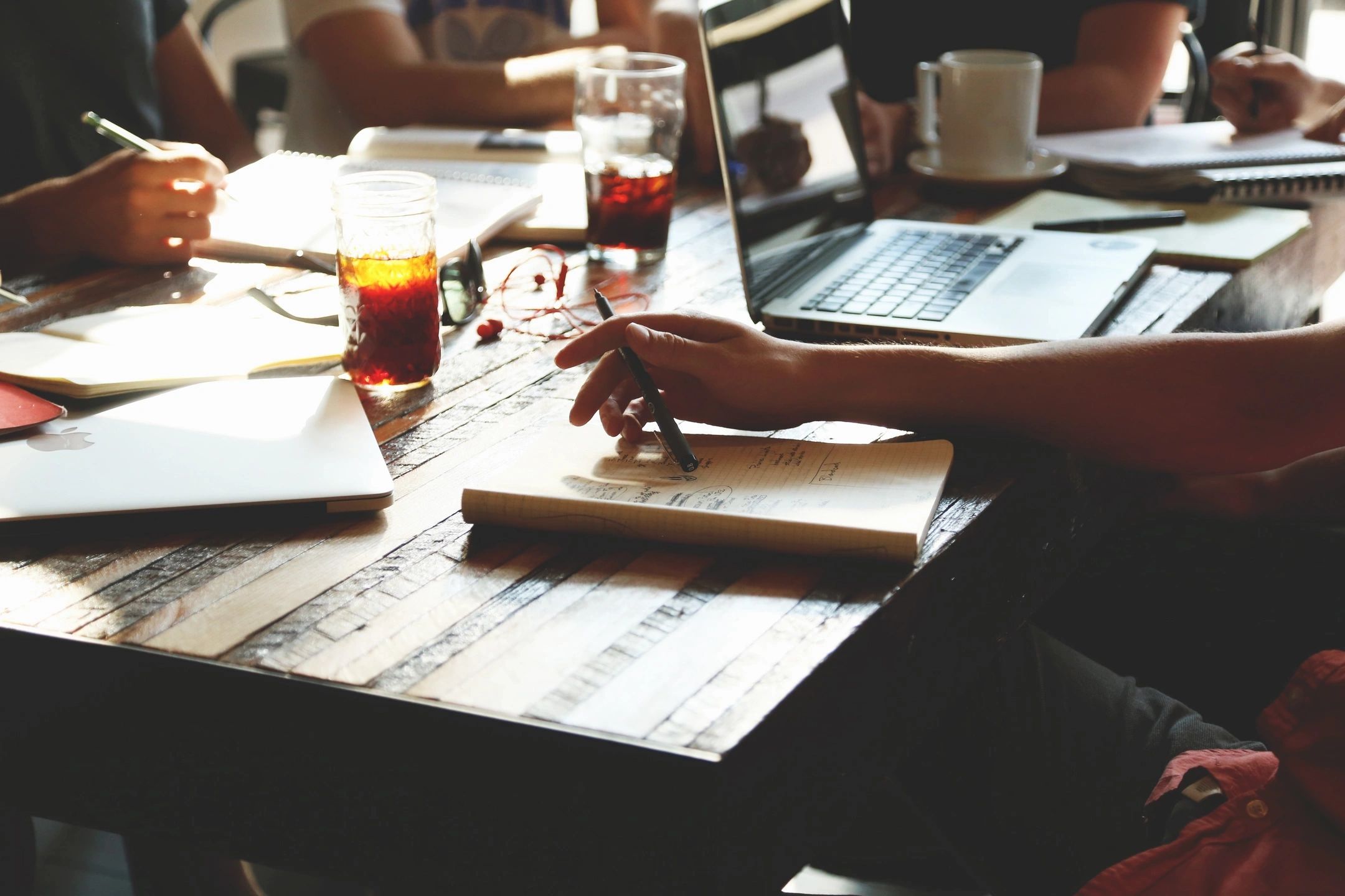 laptops on a desk with tea